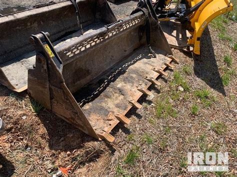 what manufacures make a multi pupose skid steer bucket|skid steer buckets near me.